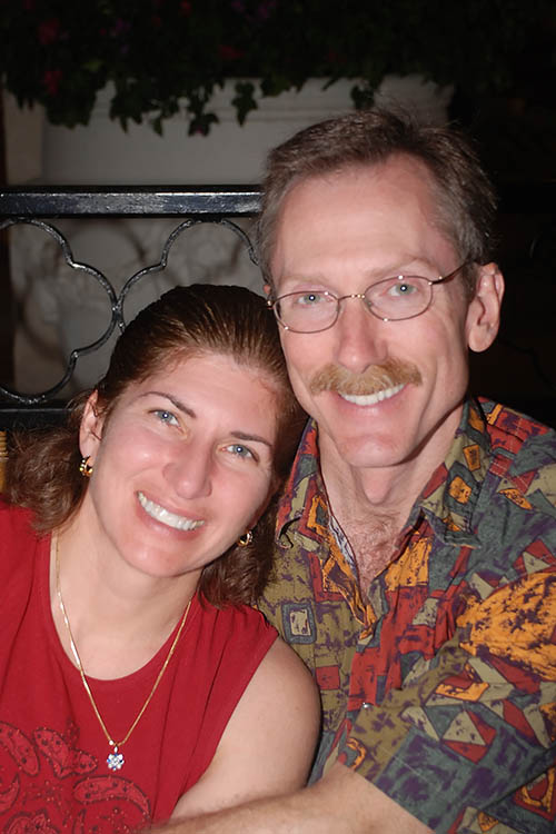Sandals1.jpg - Hali and Mike relaxing at dinner.  This was shot by a Sandals photographer.
