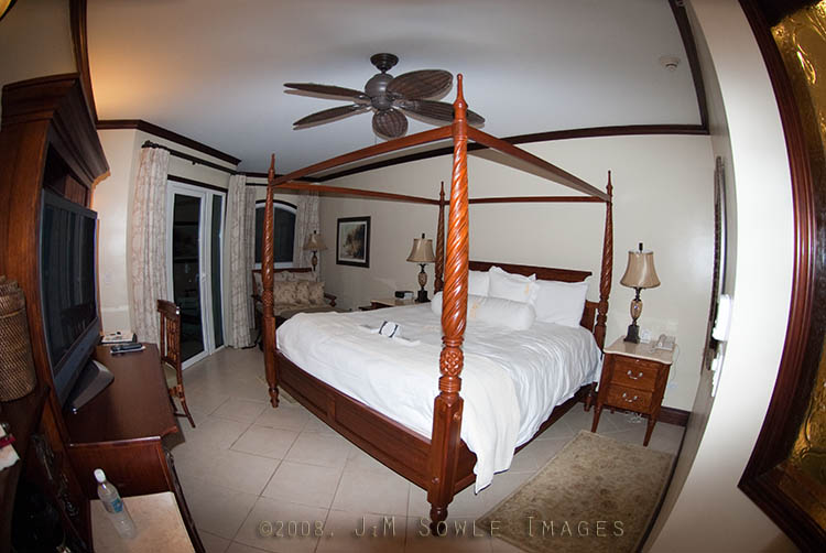 _JMS0003.jpg - This was our wonderful room during our stay.  There was a small balcony off to the far-left with a tiny table and two chairs.  The fully stocked bar and mini-fridge are just off frame to the near-left.