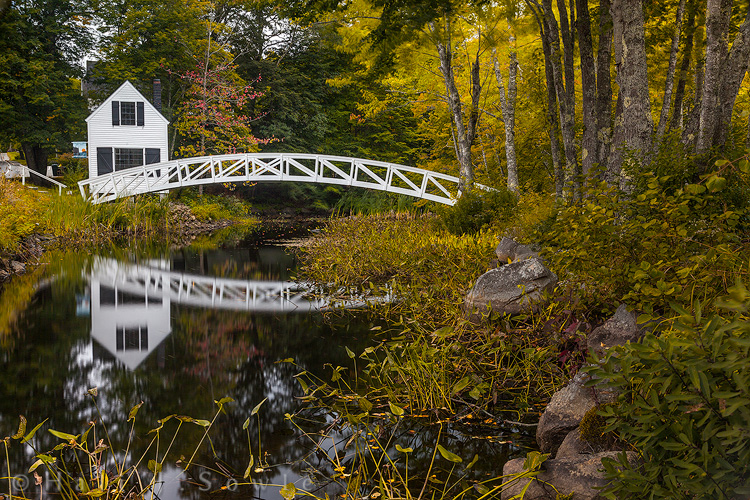 2011_09_21_AcadiaNP-10017-Edit750.jpg - Sommesville Maine is the oldest settlement on Mount Desert Island, the home of Bar Harbor and Acadia National Park.  This footbridge is one of the most photographed spots on the island away from Bar Harbor and the Park.  Somes Sound is the only fjord on the east coast of the U.S.  It is a result of a mile high glacier that created the 7 mile long gouge that is the sound and left it dotted with mountain tops, lakes and boulders.  (from downeastmaineonline.com)