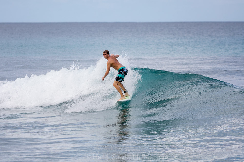 2016_11_Barbados-10841-Edit1000.jpg - A young man who was staying at one of the local places, I believe on school break.  He was a good surfer and like all the other people I watched they were all very courteous to the other surfers in the water.