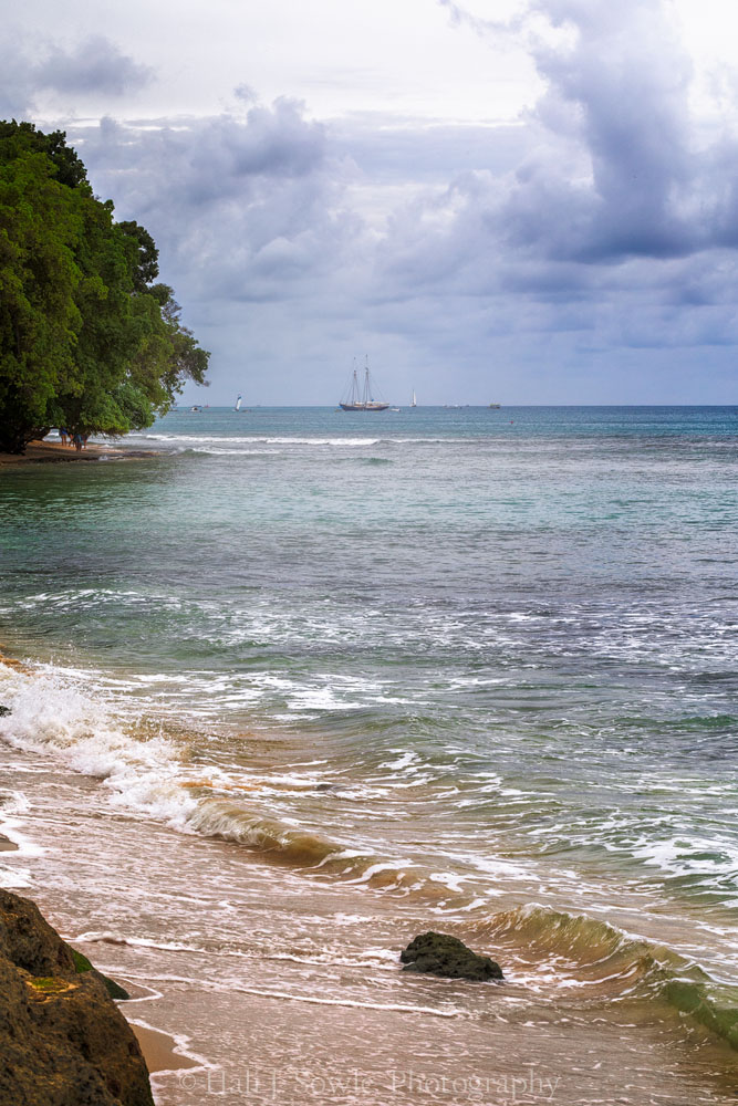2016_11_Barbados-13499-Edit1000.jpg - We had one day of torrential rain, so much that the first floor of the resort was flooded.  The staff at the resort worked like crazy to make sure that we were able to have meals and to clean up from the flooding.  This was the day after the storm with the clouds still burgeoning the horizon and the water quite turned up.