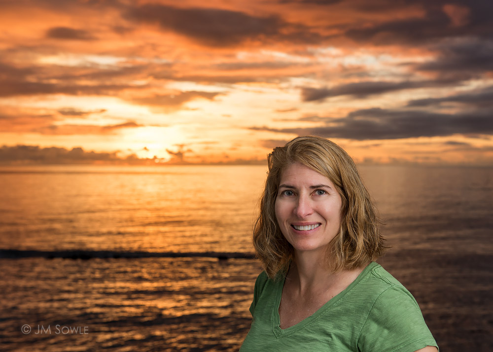 _JMS0152RSP.jpg - We passed on shooting the sunset on this day, but as we were getting ready to go out for dinner I looked out of our room balcony to see this amazing sunset. I think Hali was still combing her hair when I dragged her over to pose for a picture.