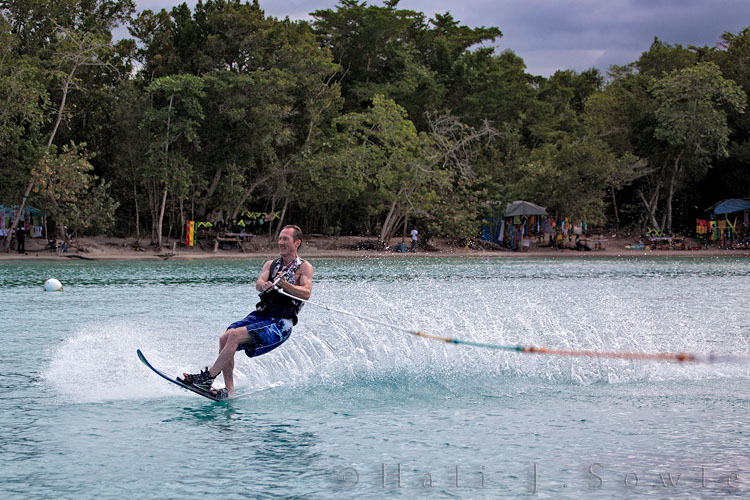 2011_01_22_BreezesGrand-10255-Edit750.jpg - The ski boat guys were very cool about letting Hali shoot from the boat.  In this shot, Mike is just beginning a turn.