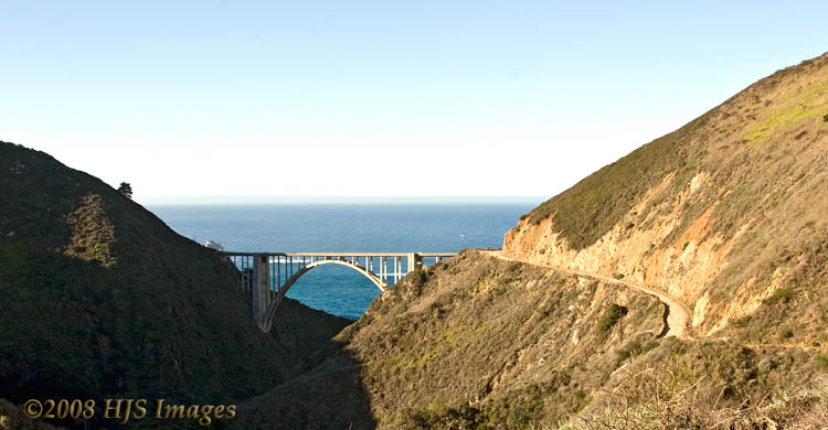 CentralCali_47.jpg - Bixby Bridge from the Old Coast Road, Big Sur.  That narrow dirt road is the old coast road.