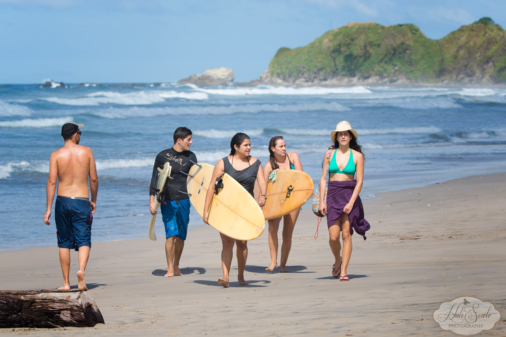 CostaRica2013_04.jpg - Morning on Playa Guiones, a group of locals headed back after their surf session.