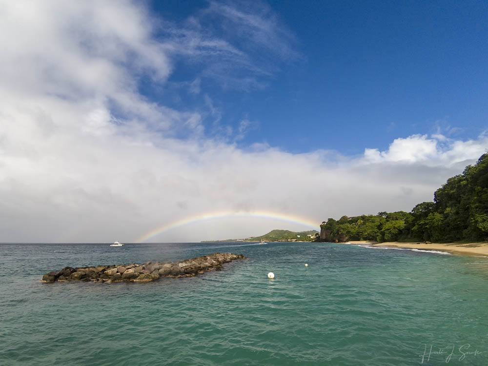 GOPR0381-Edit1000.jpg - Our first day there also graced us with an incredible double rainbow at mid day.  It was amazing how bright this rainbow was and how long it lasted.  Although we saw other rainbows during the time we were there, none were ever as beautiful as this one.