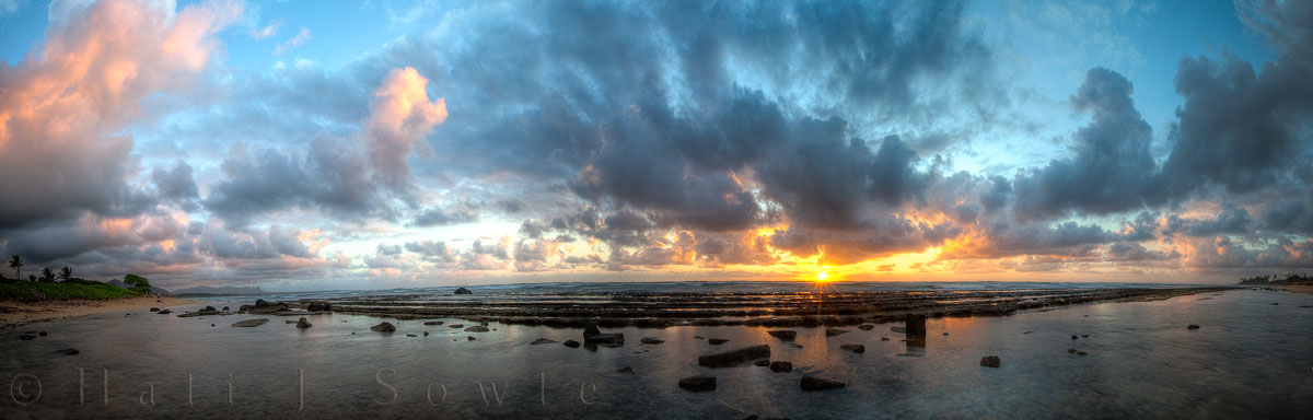2009_09_29_Hawaii-78-89_SunrisePano2.jpg - Taken while standing in the ocean in front of the Hilton.  This is a Pano HDR composed of 4 HDR images each of which was composed of 5 images taken at 1EV.  The HDR was done in Photomatix and the pano was stiched in Photoshop CS4 (which rocks!).  Adjustments were made with Nik plugins and Luminosity painting with Tony Kuypers luminosity mask actions.