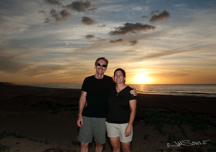 _MIK0857.jpg - A sunset shot of us at Polihali Beach -- which is at the Southwest end of the Na Pali trail.  The dirt/sand road to get here tested our resolve, but we made it!