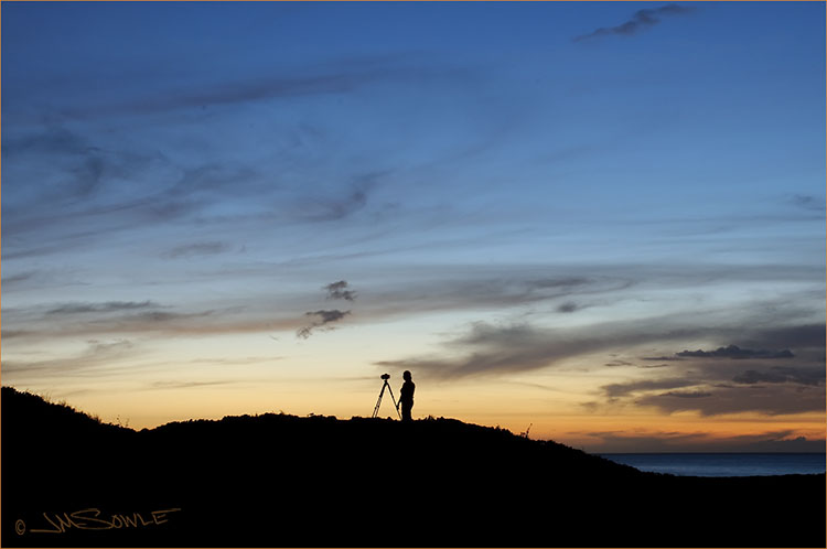 _MIK0942.jpg - It's just a few minutes after sunset at Polihale beach, and Hali is setting up her camera to capture the "after glow".