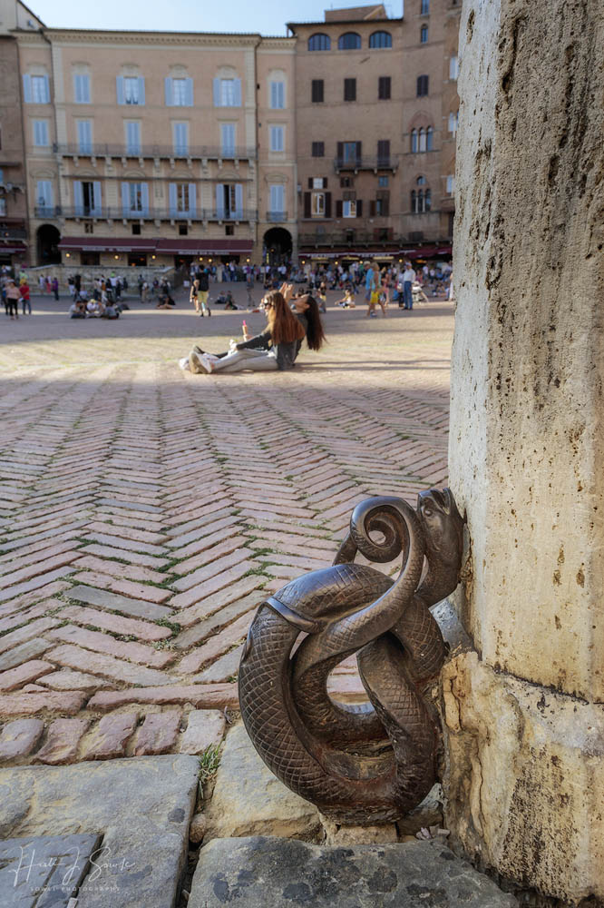 2017_09_14_Italy-10401-Edit1000.jpg - On the outskirts of the Piazza in Siena was this old, ornate bronze sculpture that I think had to be an old hitching spot.