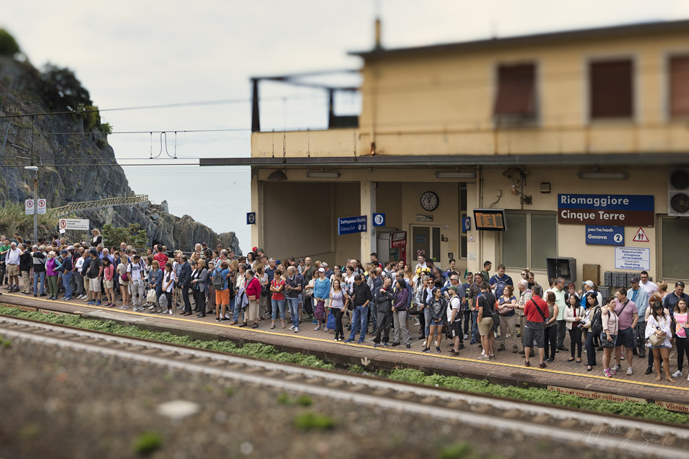 2017_09_16_Italy-10106-Edit1000a.jpg - We had heard that the Cinque Terre was crowded, and knew that we were going towards the end of the busy season but most of our pictures don't show how crazy busy it was.  This was the usual mid day crowd waiting to go to the other villages, and the trains came nearly every 20-30 minutes at that time of day