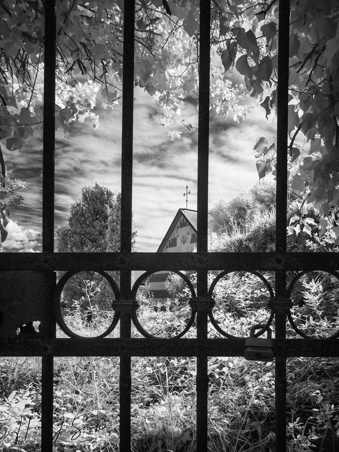 2017_09_19_Italy-10183-Edit1000.jpg - I'm not sure if this is part of the Convent of Cappuccini, as seen through a gate on our way up to the cemetery on San Cristoforo hill, infrared.
