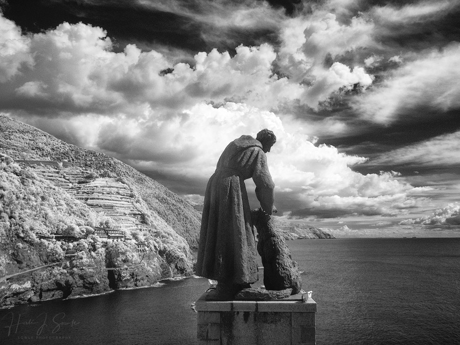2017_09_19_Italy-10326-Edit1000.jpg - Statue of San Francesco with his dog.  The statue sits halfway up the stairs to the church of San Francesco and at the dividing point between the new part of Monterosso (where the train comes in) and the older part.