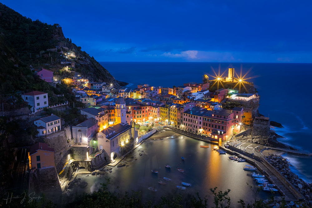 2017_09_19_Italy-10537-40Blend-Edit1000.jpg - Vernazza, Blue Hour.  It had been lightning, thundering and  pouring rain just an hour before and we weren't sure if we would make it up to the viewpoint for this shot, but Mike saw a break in the weather and we made fast tracks to get up there before the light was all gone.