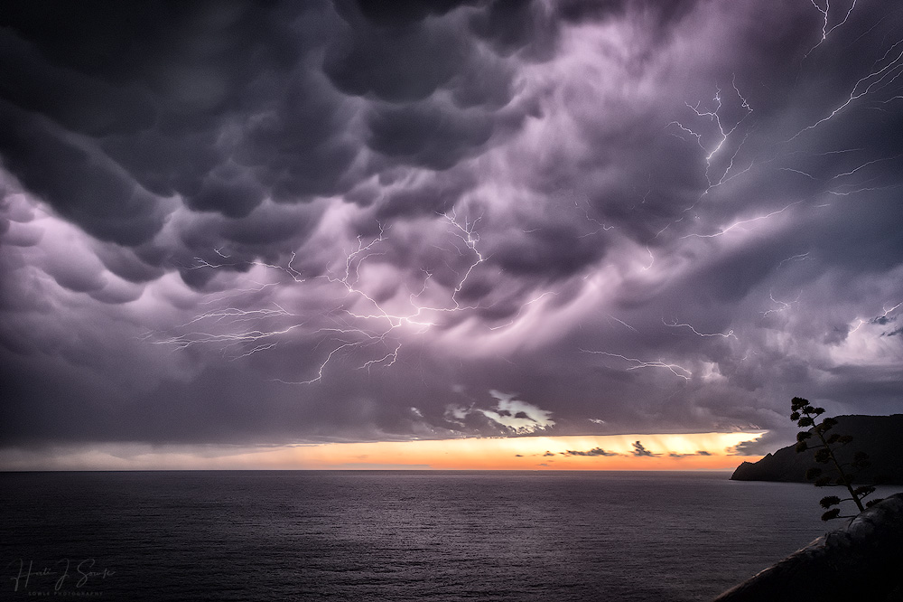2017_09_19_Italy-10697-Edit1000.jpg - The thunderstorm was still raging to the north as we stood cliffside shooting pictures of Vernazza.