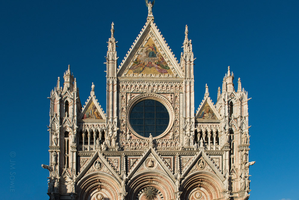 _JMS1093.jpg - The Siena Cathedral is an incredibly impressive medieval church that was originally designed and completed between 1215 and 1263.  The scale and the artwork are overwhelming.  You could spent an entire day taking pictures of this cathedral.