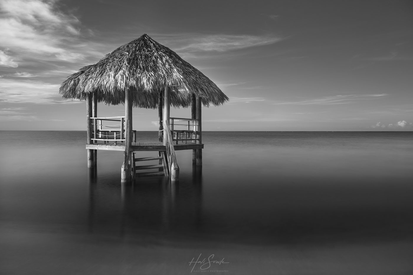 2019_09_Sandals-SouthCoast-10051-Edit1000.jpg - Ah, the in water palapas.  They were a little worse for the wear this visit.  The steps were broken and very slippery, but they were still great places for people to gather during the day and they were fun to snorkel around too.   Infrared image shot just after sunrise.