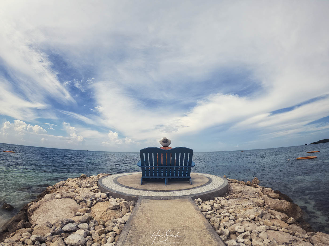 2019_09_Sandals-SouthCoast-10399-Edit1000.jpg - Mike enjoying a moments rest during one of our walks up and down the beach.  GoPro Hero 7.