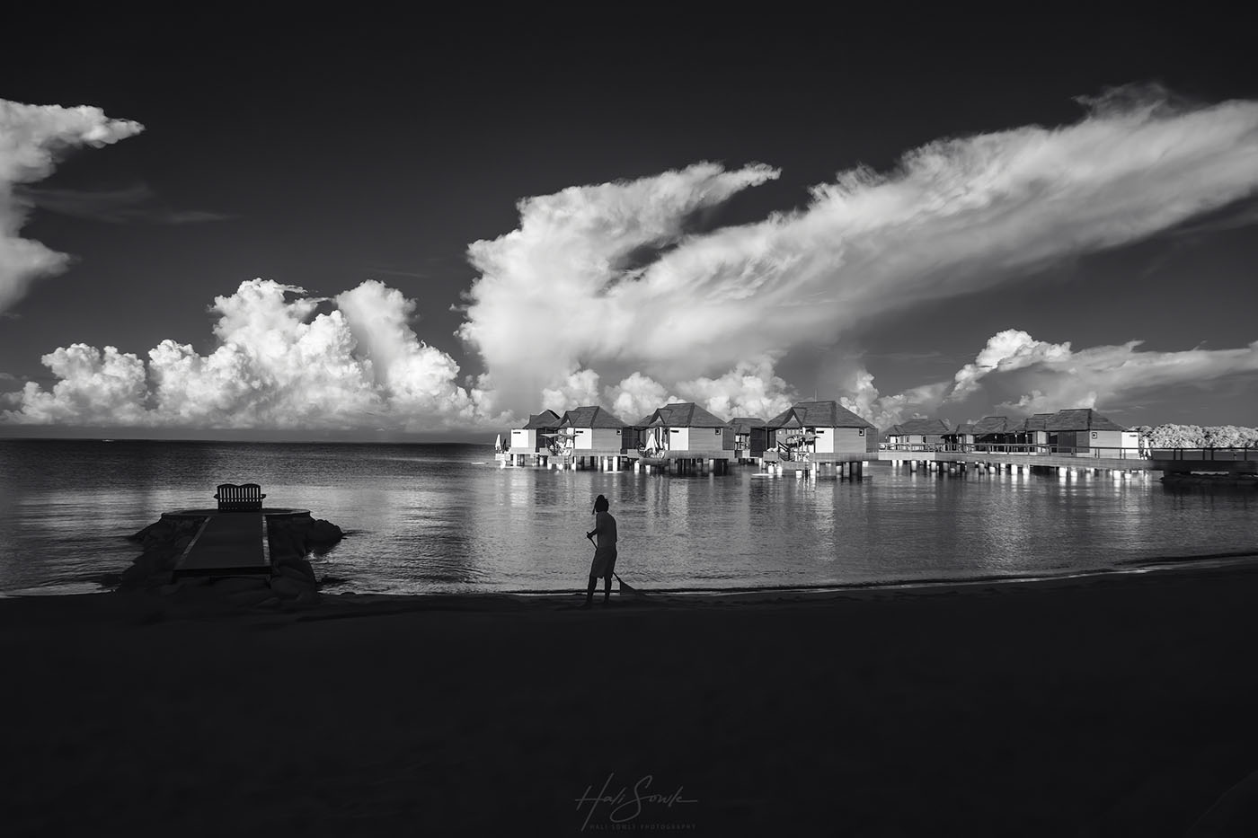 2019_09_Sandals-SouthCoast-10501-Edit1000.jpg - Another morning shot in infrared.  The watersports guys were also charged with raking the beach every morning and they did a great job of removing the sticks and leaves and other debris that accumulated during the day.  The light and clouds were stunning this morning, about 15 minutes after the sun had come up over the mountains.