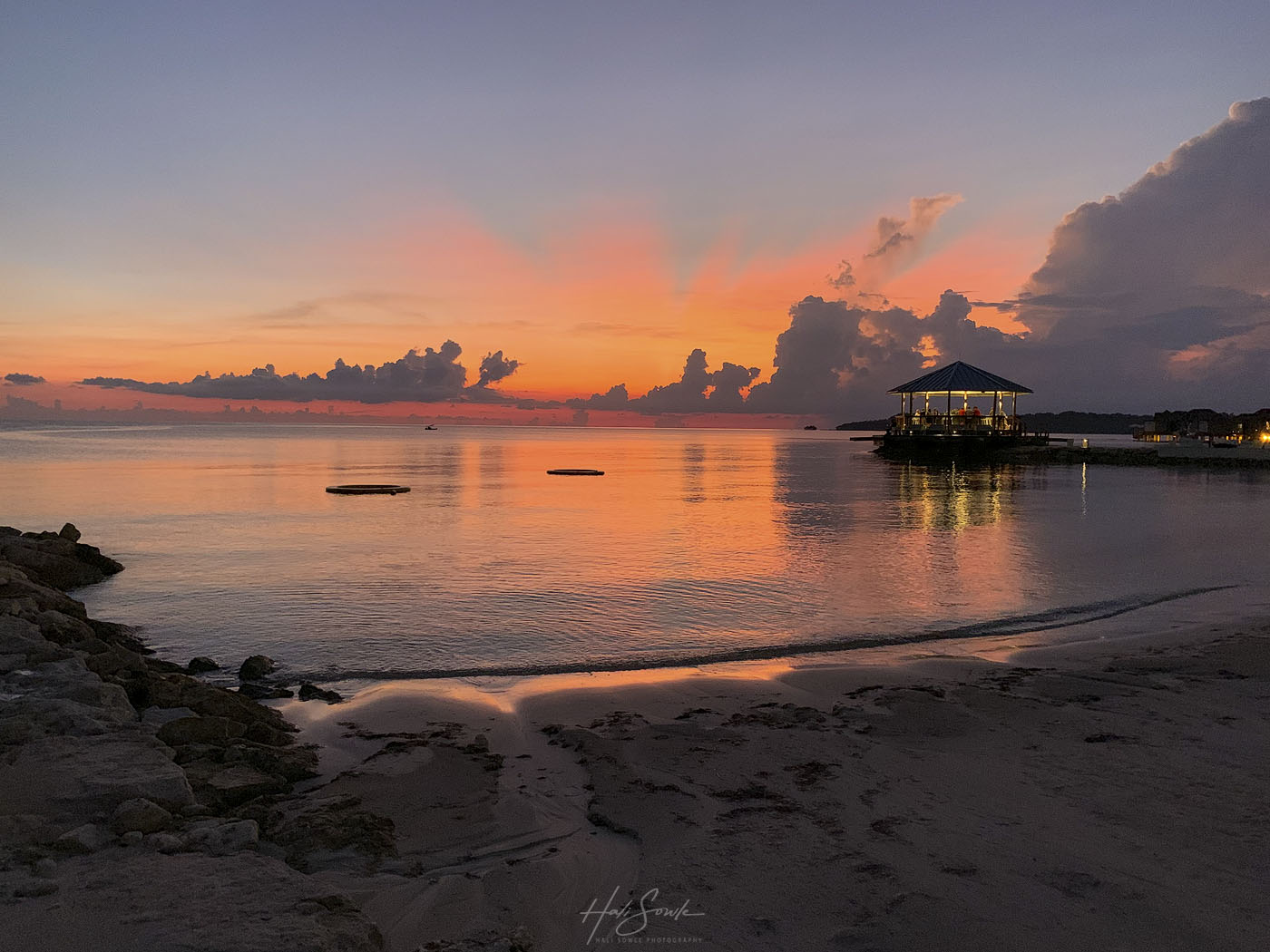 2019_09_Sandals-SouthCoast-10792-Edit1000.jpg - Iphone sunset.  We only took out our SLR's once for sunset, but after we put them back in the room and went down for dinner this was what greated us on the beach.  They say the best phone is the one you have with you and the iPhone came through.