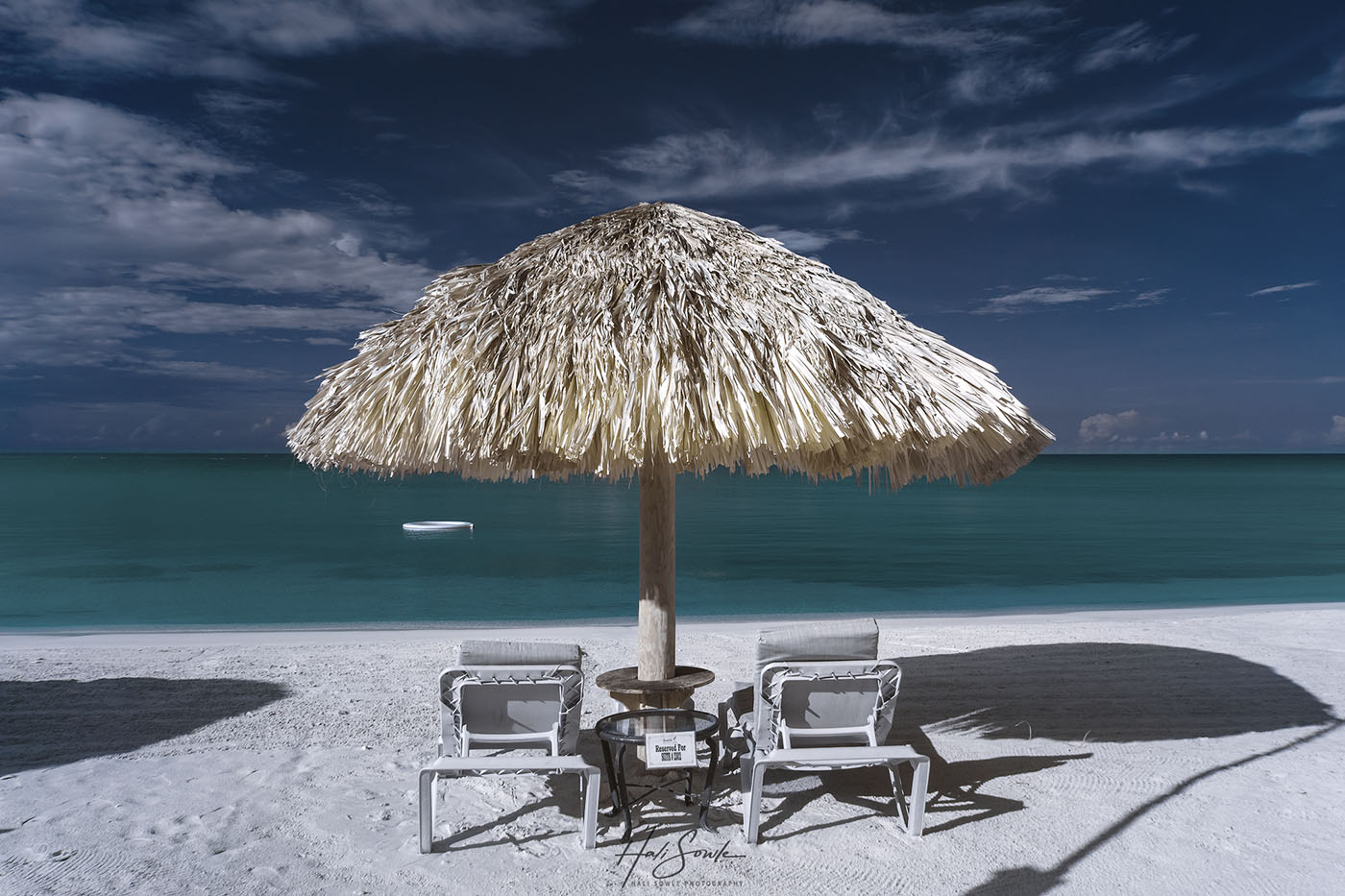 2019_09_Sandals-SouthCoast-10947-Edit1000.jpg - Faux color infrared of the beach and chairs.  We took a long morning walk after breakfast the morning we were leaving.  As always it was hard to leave this wonderful resort.