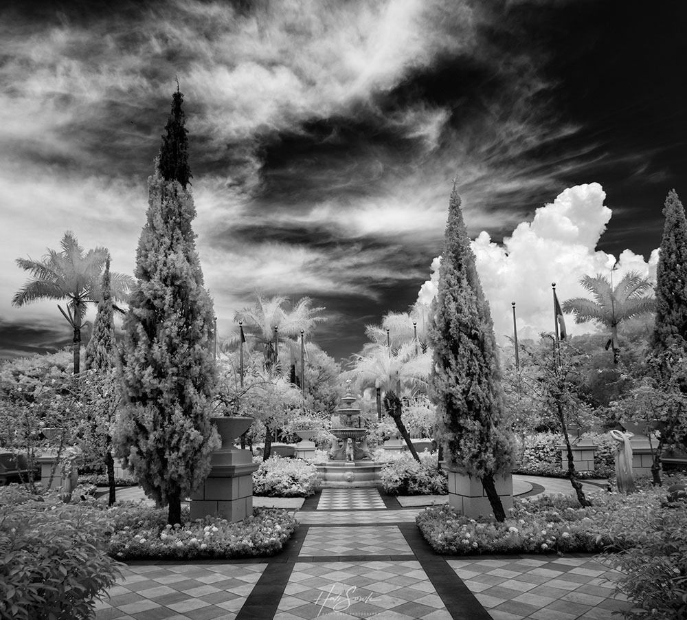 2019_09_Sandals-SouthCoast-10999-Pano-Edit1000.jpg - We never really walked around the beautiful garden in the front of the resort.  This is the very last picture I took before we got on the buses to head to Montego Bay.  The clouds were building up, presaging the afternoon downpour.