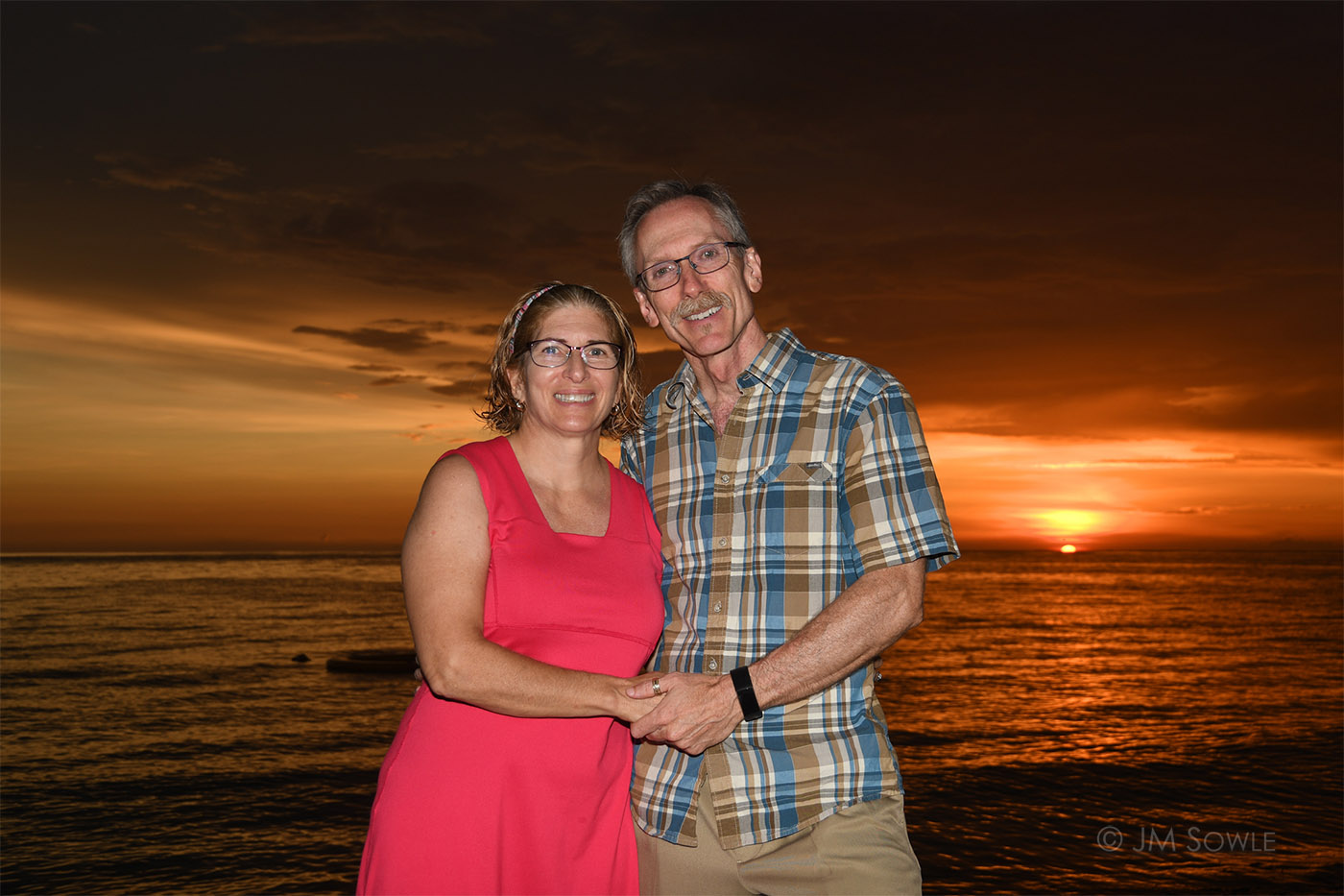 530915075Adj_1400.jpg - We rarely pulled out our DSLRs, but this sunset was so epic that asked one of the resort photogs to snap a shot of us (which we then purchase from the resort).