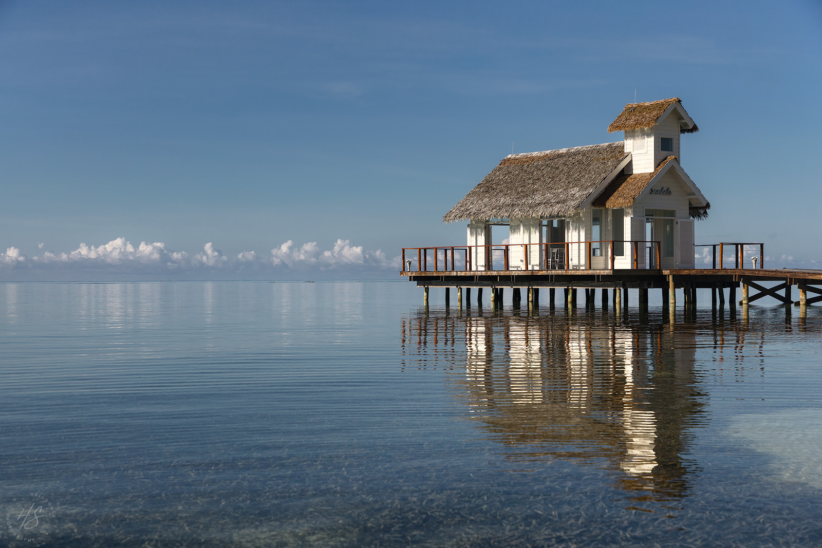 2021_09_SandalsSouthCoast-11012-Edit1600.jpg - Early morning light on the over the water wedding venue.  The water was still and wonderfully clear.