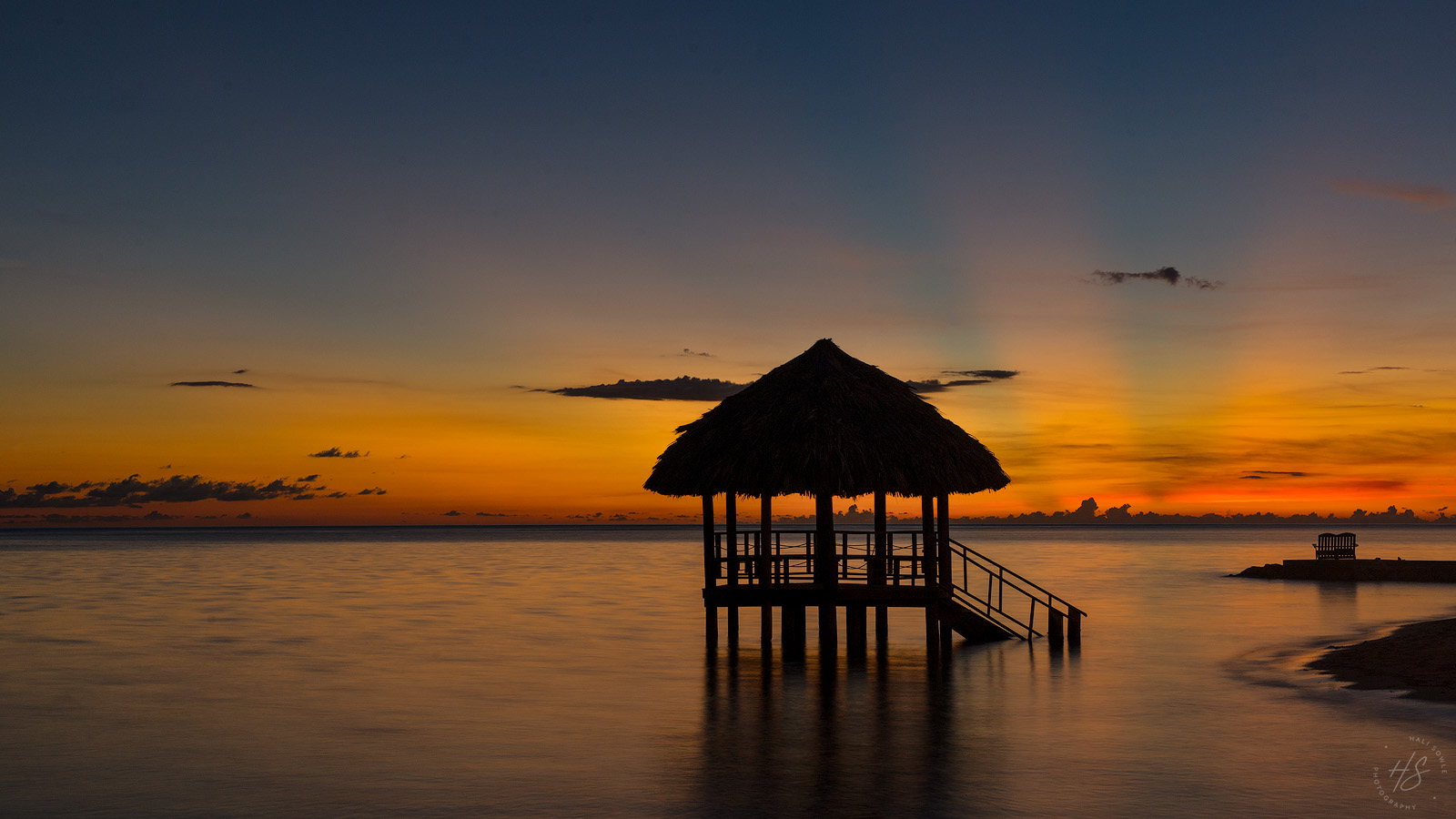 2021_09_SandalsSouthCoast-11226-Edit1600.jpg - Our last night, as sad as that was, also delivered another gorgeous sunset.  The color lasted for nearly a half an hour with those beautiful sunrays shooting up into the sky.
