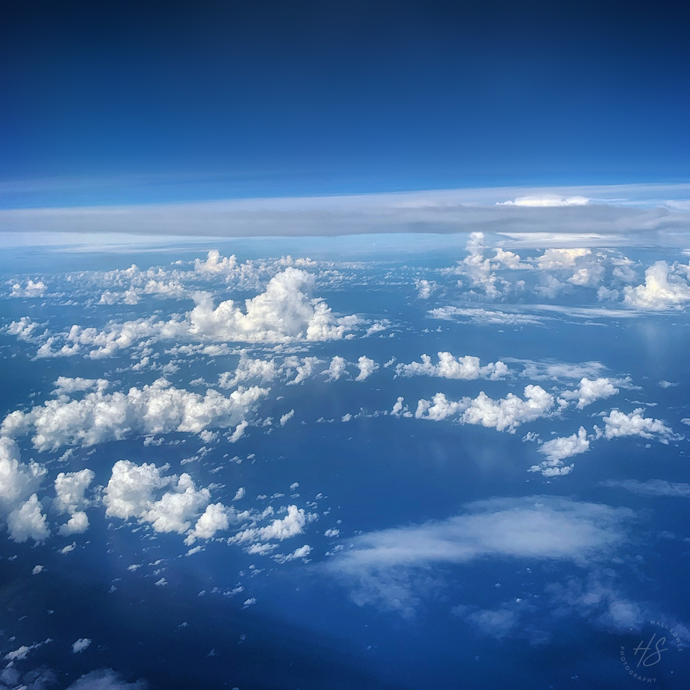 IMG_8261_Edit1600.jpg - In the clouds - Iphone shot from the plane on our way to Montego Bay.