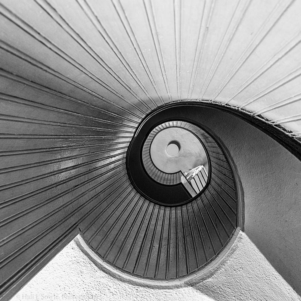 2017_05_SanDiegoandJoshuaTree-10049-BW_Edit1000.jpg - Staircase in the old Point Loma Lighthouse.  This lighthouse was first lit in 1855 and was in service for 36 years, it was taken out of service on March 23, 1981.  The lighthouse was built on a bluff 422 feet above sea level at what looked to be a good location, but the light was often obscured by fog and low clouds.
