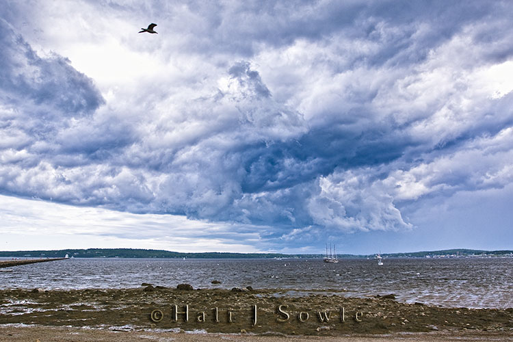 2009_07_04_Maine-40-Edit-Edit-3.jpg - We took a walk out to the Rockland Headlight out on the end of Rockland Pier, and as I reached the end I noticed it was getting a bit dark.  This storm was rapidly approaching from the NW, we hurried back down along the pier stopping along the way to snap a few shots of the stupendous clouds.  Amazingly enough despite the heavy rumble of thunder there was no lightning and no rain.