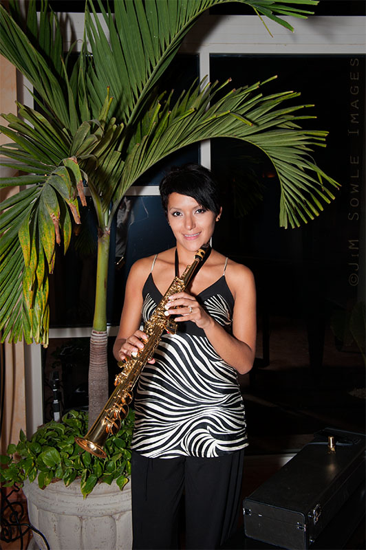 _JIM0008.jpg - There was often live music being played at various locations around the resort.  Sometimes during a meal.  Sometimes on the beach.  The musicians were all very good, and it really enhanced the ambiance.  This is a shot inside the martini bar at night.