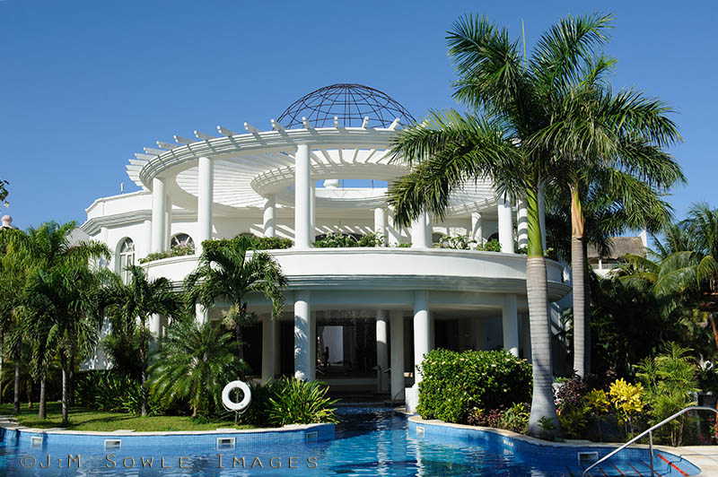 _JIM0401.jpg - The Spa building in the center of one of their pool systems.  You've heard of swim-up bars before, but have you ever heard of a swim-up spa?  You could swim right in, if you want.