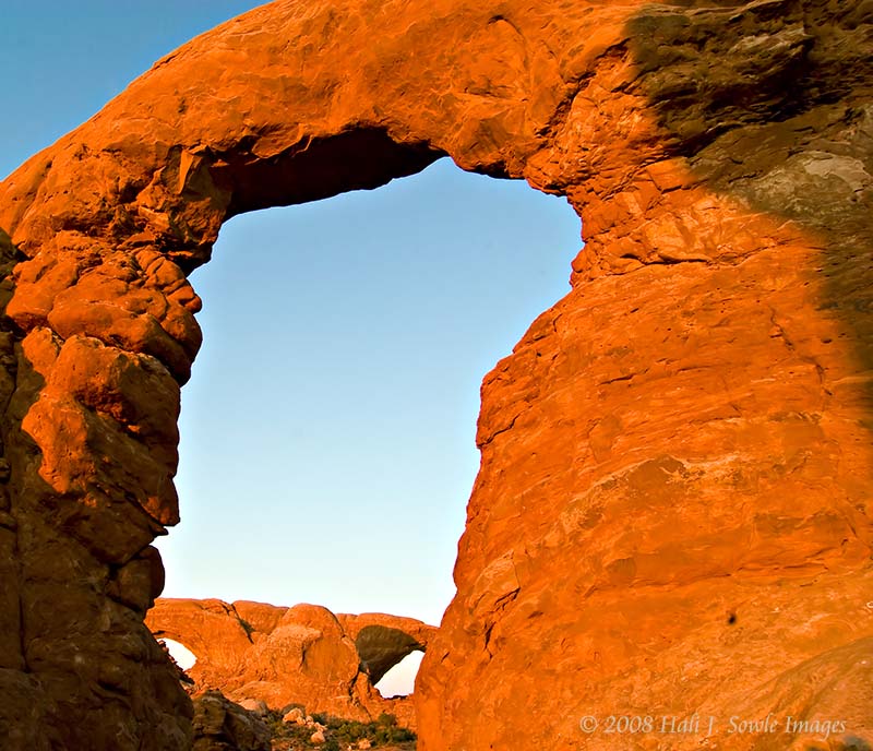 2008_09_04_Moab_386.jpg - North and South Windows seen through Turret Arch in the last light of the sun.