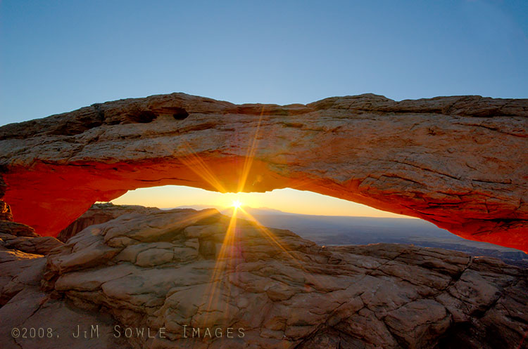_DSC0406-0408.jpg - Mesa Arch at sunrise is an easy shot to get.  A much more difficult shot to get is one of Mesa Arch at sunrise -- without some other photographer in your shot.  This is an exposure blended shot that makes it look like nobody else was there.