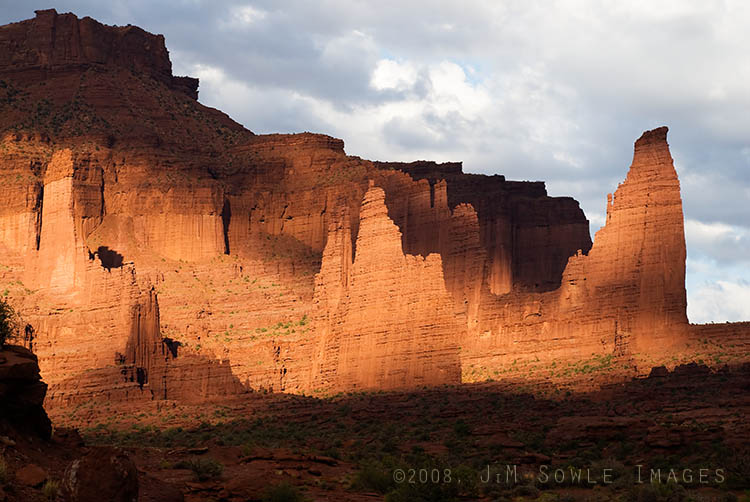 _JMS0339.jpg - This is a shot of Fisher Towers on a cloudy afternoon.  The sun broke through the clouds long enough to shed a little late afternoon on the rock.