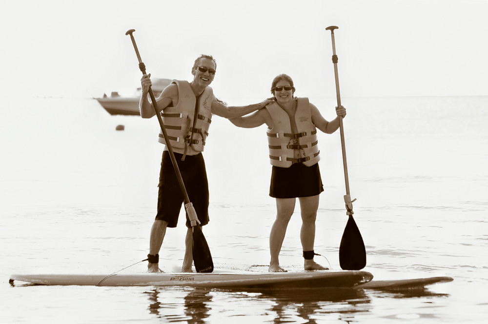 140112160ADJ.jpg - And another shot from the resort photogs.  This one after we tried out their SUPs.  They only had 2 working SUPs the entire time we were there, but we still managed to get some time on them.