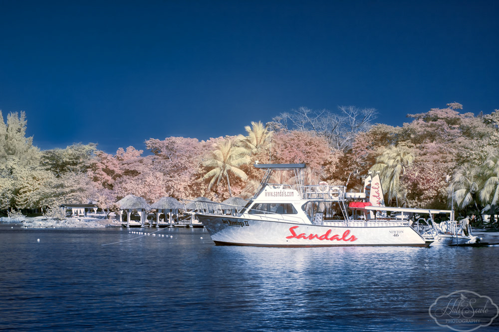2014_01_SandalsNegril-10007-Edit1000.jpg - The Sandals Dive boat waiting for the morning divers to load in.  Faux color infra-red.