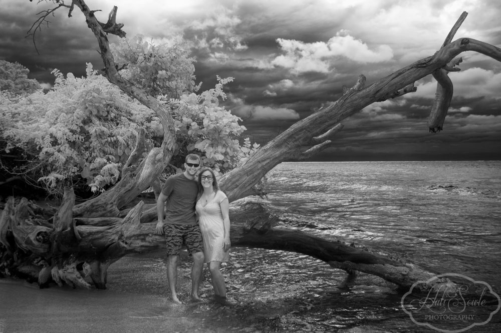 2014_01_SandalsNegril-10863-Edit1000_SEP2.jpg - Lincoln and Summer.  We met these two at the resort when we got there, they were getting married at the resort.  It was fun hanging around with them before and after their ceremony.  They walked with us to Beaches Negril on this cloudy day the day after their wedding and they were the only people at the resort who were willing to body surf with us when the storm moved in.