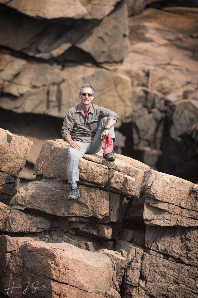 2018_09_Maine-10397_edit1000.jpg - On our last full day we walked the Coastal Trail.  As many times as we have been to Bar Harbor and Acadia we have never walked it.  My knee was giving me a bit of trouble so it was the perfect hike - long and flat.  Here is Mike after hiking out along the big outcroppings of rock.