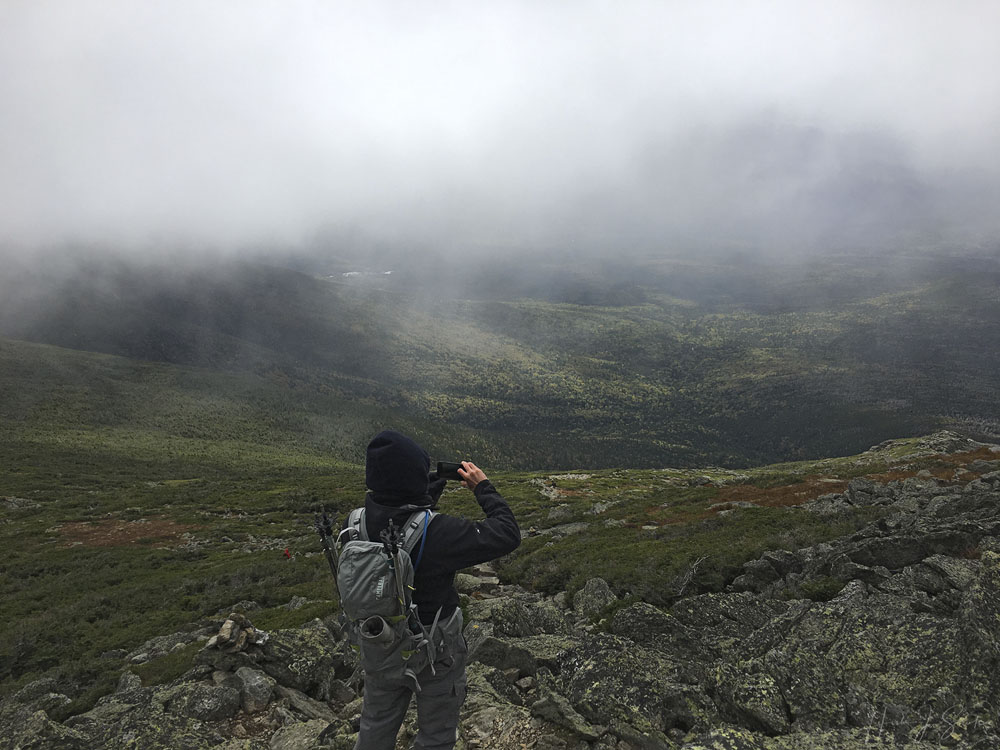 2018_09_WhiteMountainsNH-10249-Edit1000.jpg - Mike taking a pano of the area, you could start to see the valley below.