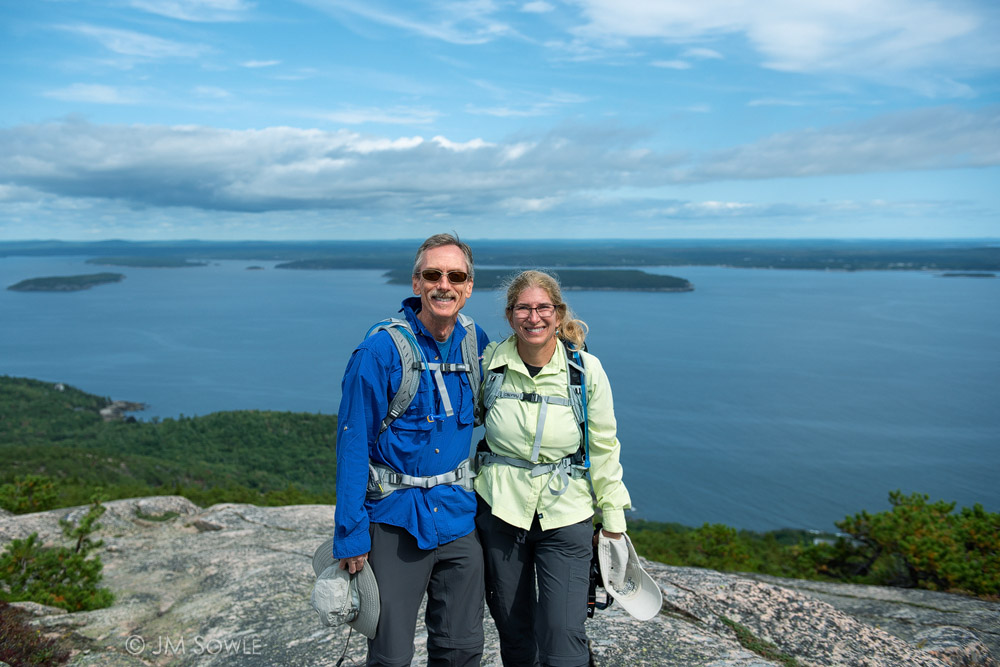 MIK_0077.jpg - At the top!  We traded picture taking favors with another couple of hikers at the top of Precipice Tail.  We had been warm on the way up, but there was a refreshingly cool breeze at the top.