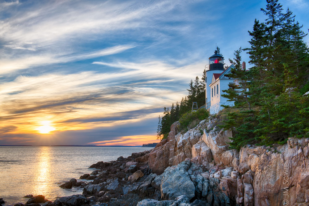 _MS00191-00195_HDR.jpg - Bass Harbor Head Light at sunset.  It looks so quiet and tranquil, but there were dozens of people scattered across the rocks for sunset.  Some of them were just enjoying the experience of being there, while others were trying to get a great photograph of an iconic location.