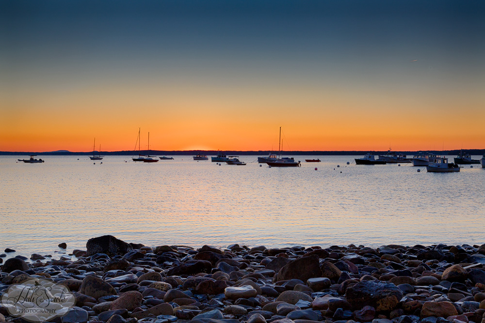 NovaScotia_03.JPG - Sunrise at Lincolnville Beach, the sun was just coming up over the horizon into a cloudless sky for this shot.  After getting up at 5AM for this we went back to the motel and took a well deserved nap!