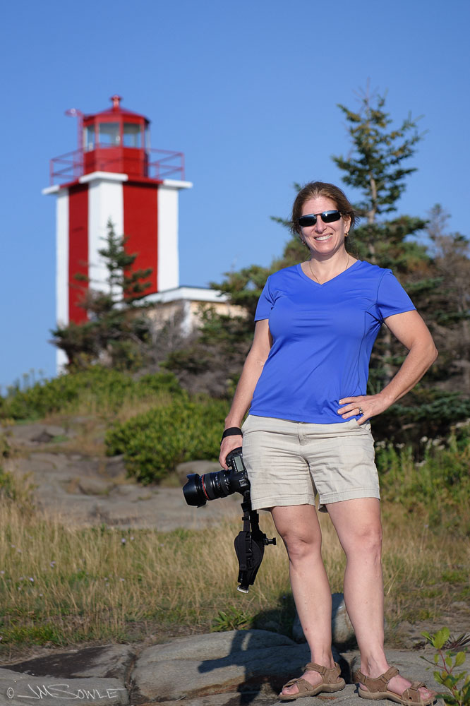 NovaScotia_20.JPG - Hali striking a pose at the Prim Point Lighthouse in Digby, Nova Scotia.  Please note that this lighthouse is not to be confused with the Point Prim Lighthouse -- which is totally different.