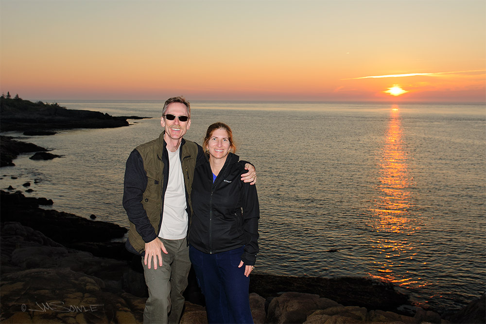 NovaScotia_22.JPG - Even in late August, Nova Scotia can get a bit cool when the sun starts heading down.  The two of us enjoying a beautiful sunset at Prim Point Lighthouse in Digby.  This was our first night of the trip in Nova Scotia.