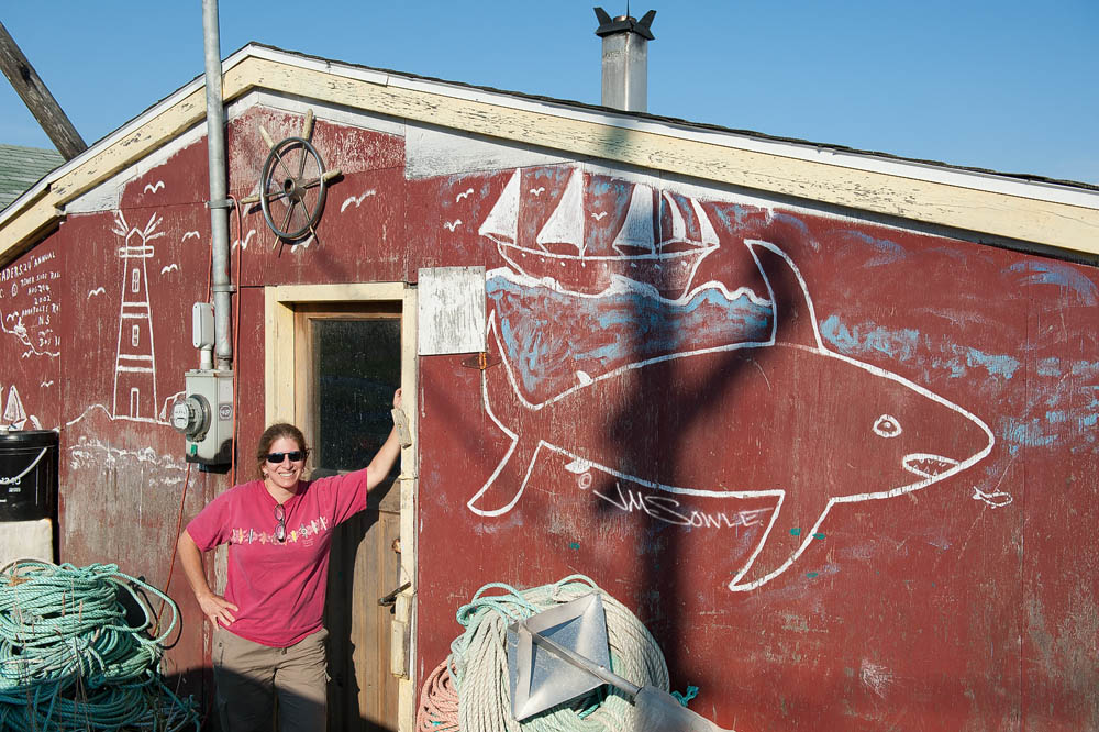 NovaScotia_38.JPG - We were just killing time waiting for the Ferry (after our whale watch trip).  This neat building was right next to us, so I asked Hali to strike a pose for me...