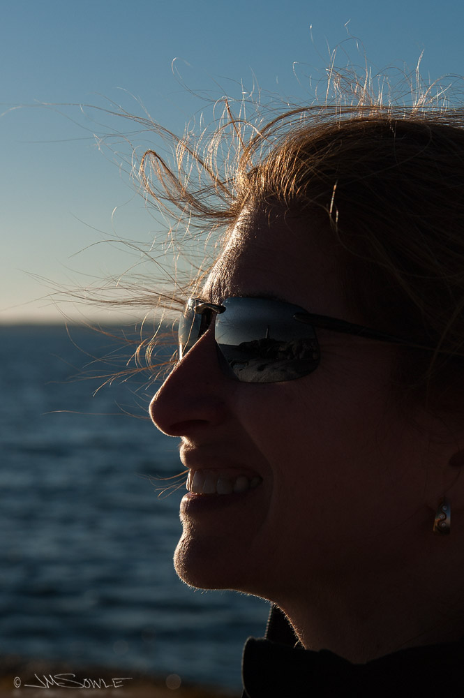 NovaScotia_57.JPG - I'm checking out Hali, while Hali checks out the Peggy's Cove Lighthouse.