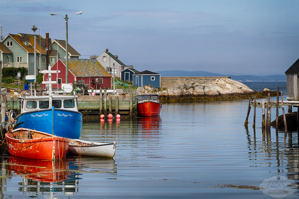 NovaScotia_62.JPG - It's easy to see why Peggy's Cove is such a draw for tourists, it's a beautiful little village, with brightly painted houses, and boats and pretty harbor.